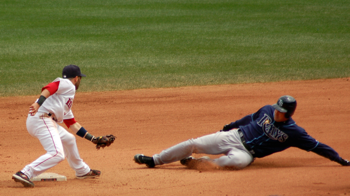My favorite of the photos I took today.  Pedroia waiting for Burrell with the ball in his glove.